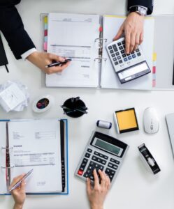 Business professionals working on invoice.