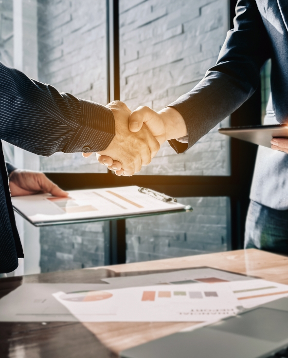 Business people shaking hands.